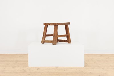 Lot 52 - A joined elm stool
