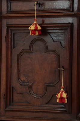Lot 67 - A walnut credenza