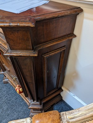 Lot 67 - A walnut credenza