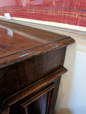 Lot 67 - A walnut credenza