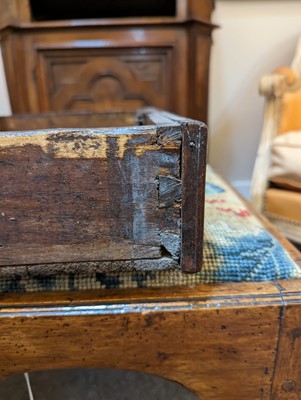Lot 67 - A walnut credenza