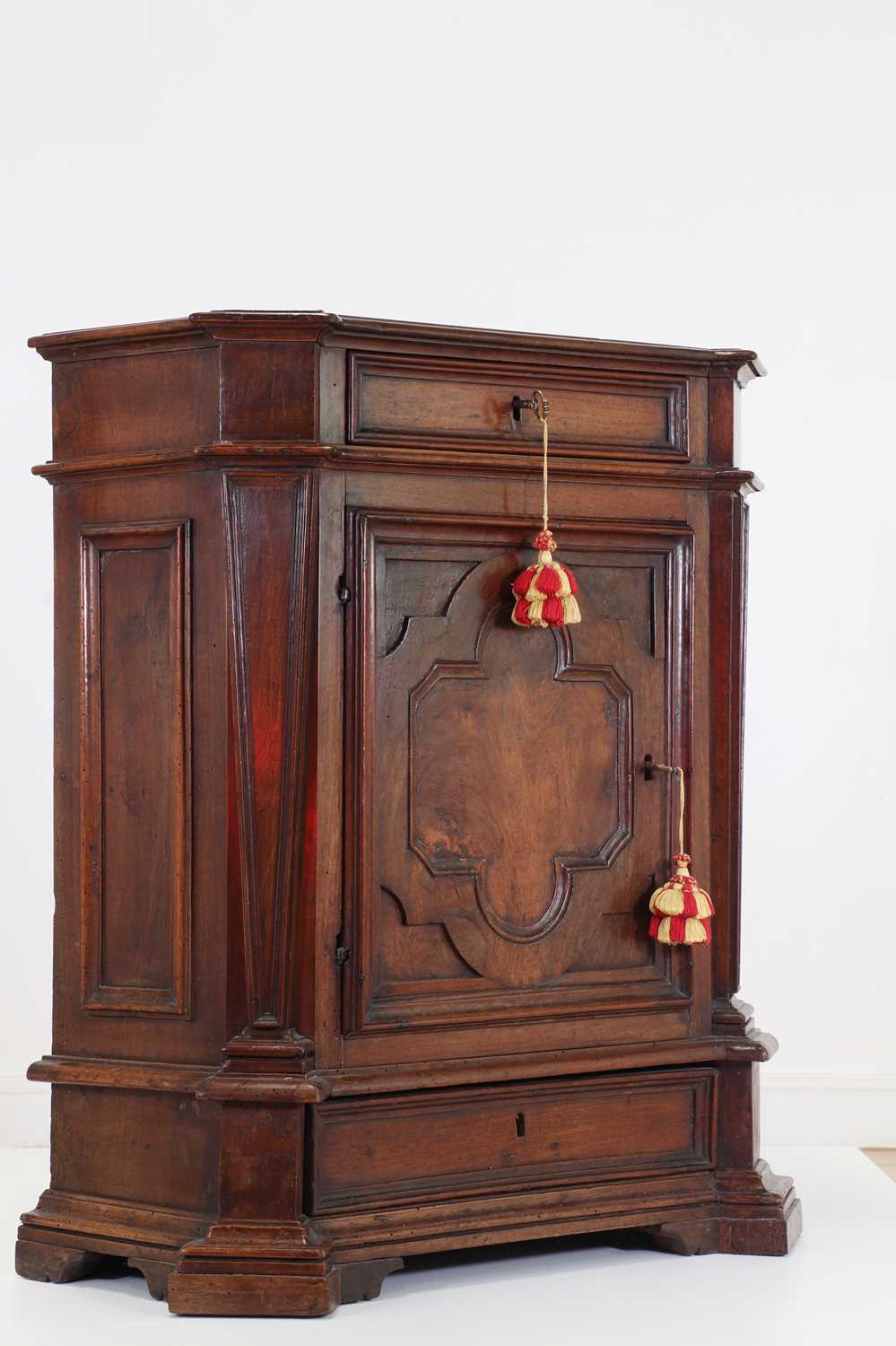 Lot 67 - A walnut credenza