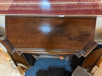 Lot 67 - A walnut credenza