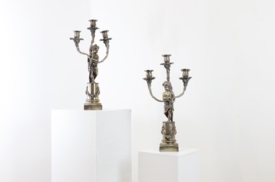 Lot 123 - A pair of Louis XVI-style silver-plated candelabra