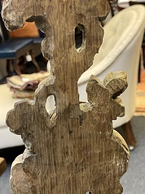 Lot 7 - A group of carved and pierced oak wall appliqués