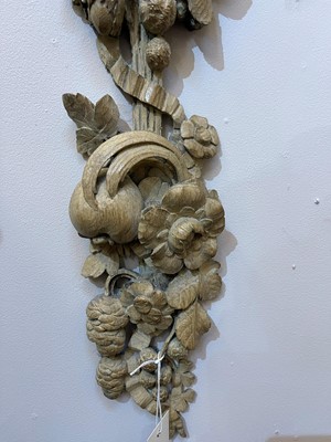 Lot 7 - A group of carved and pierced oak wall appliqués
