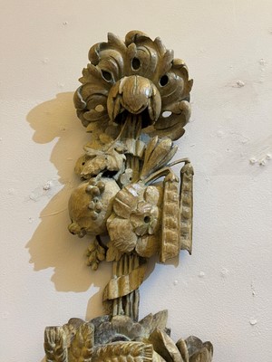 Lot 7 - A group of carved and pierced oak wall appliqués