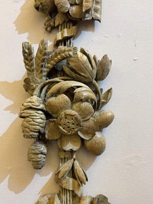 Lot 7 - A group of carved and pierced oak wall appliqués