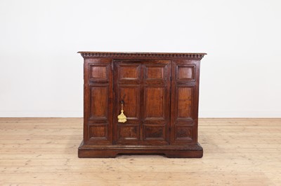 Lot 12 - A panelled walnut credenza