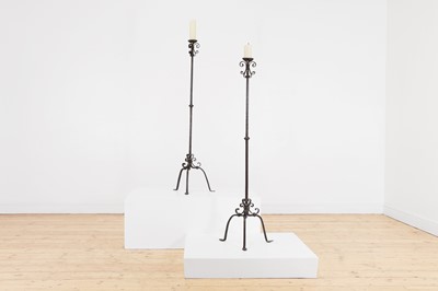 Lot 13 - A pair of wrought-iron pricket torchères
