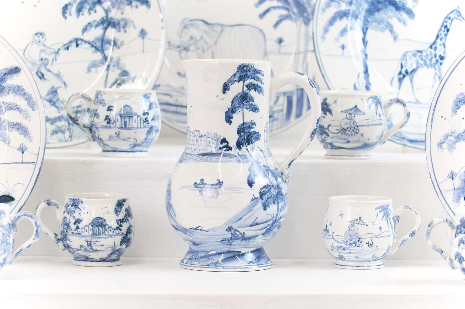 Lot 75 - An assembled collection of tin-glazed earthenware by Isis Ceramics