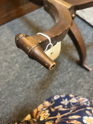 Lot 24 - A pair of teak tripod occasional tables