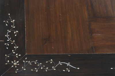 Lot 24 - A pair of teak tripod occasional tables