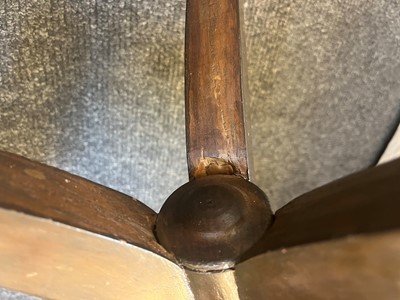 Lot 24 - A pair of teak tripod occasional tables