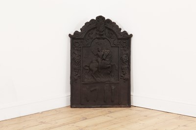 Lot 32 - A cast iron fireback in the 17th century style