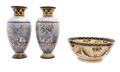 Lot 153 - A pair of Doulton pottery vases