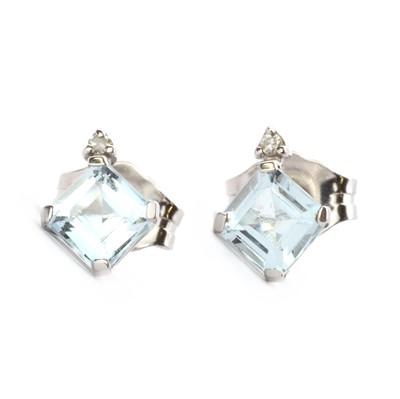 Lot 119 - A pair of 9ct white gold blue topaz and diamond stud earrings