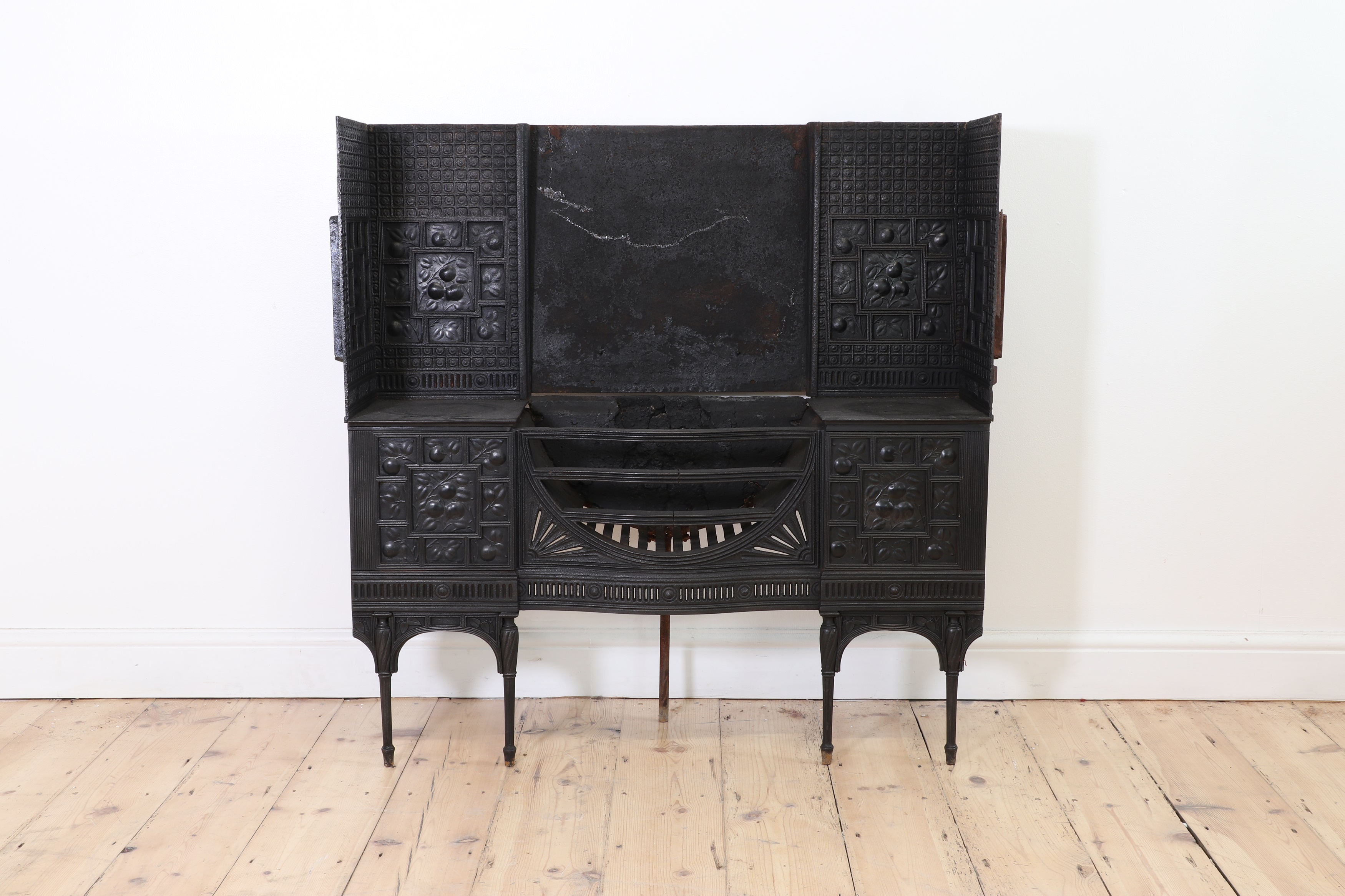 Lot 3 - An Aesthetic Coalbrookdale cast iron fireplace,