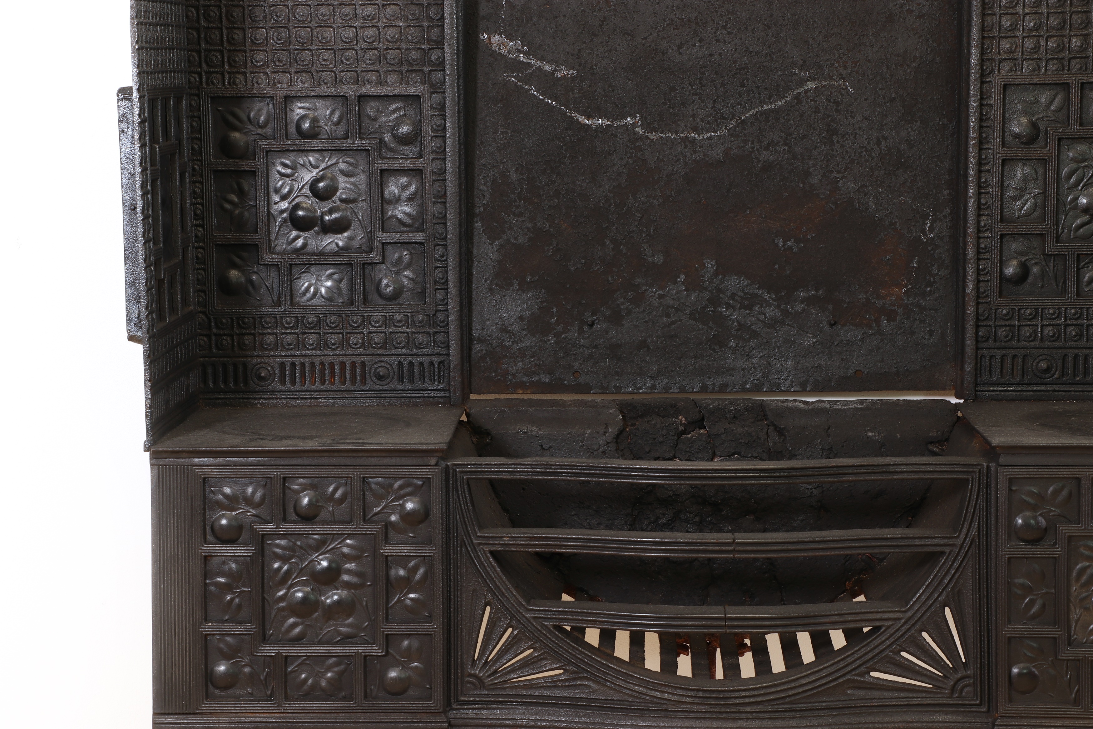 Lot 3 - An Aesthetic Coalbrookdale cast iron fireplace,
