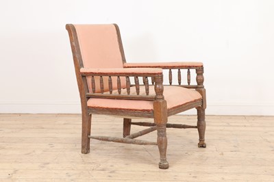 Lot 390 - An oak armchair