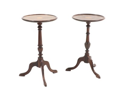 Lot 515 - A near pair of mahogany inlaid tripod tables or stands