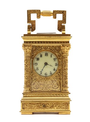 Lot 226 - A miniature gilt metal carriage clock