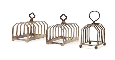 Lot 5 - A pair of six division silver toast racks