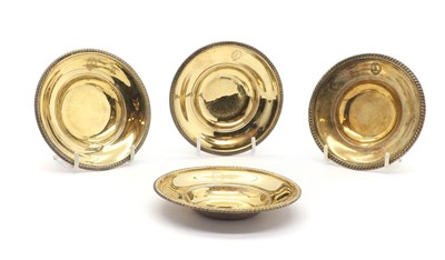 Lot 6 - A group of four George IV silver gilt dishes