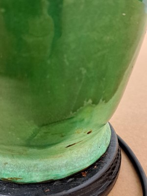 Lot 24 - An Art Deco green-glazed vase lamp