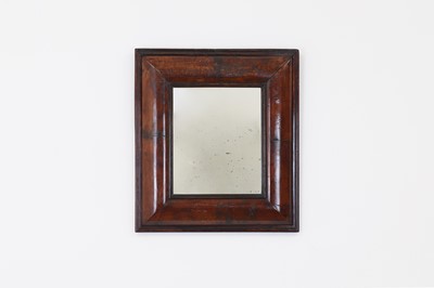 Lot 349 - A walnut cushion-framed mirror