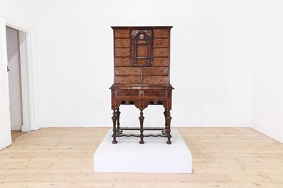 Lot 351 - A yew wood and walnut cabinet on stand