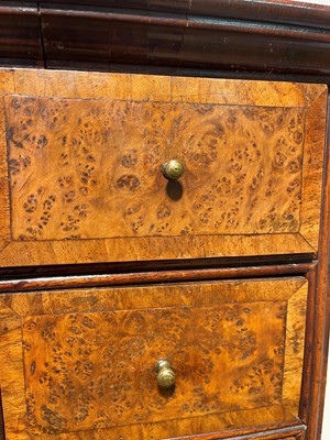 Lot 351 - A yew wood and walnut cabinet on stand