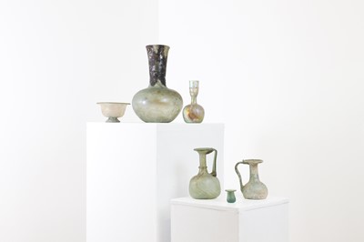 Lot 378 - A collection of Roman glass vessels