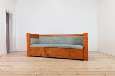 Lot 174 - A Biedermeier maple sofa