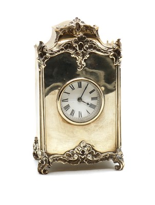 Lot 49 - A silver cased clock