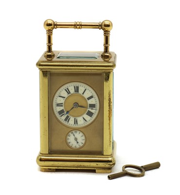Lot 302 - A brass carriage clock