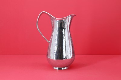 Lot 228 - A silver water jug