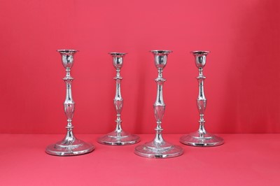 Lot 225 - A set of four George IV silver candlesticks