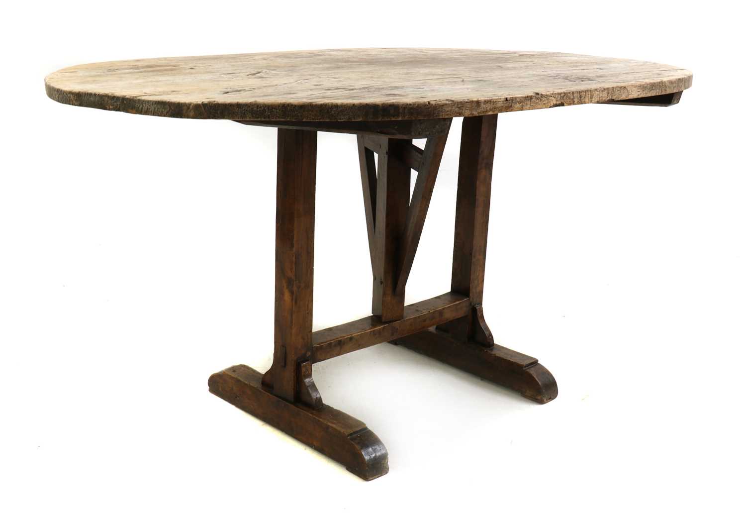 Lot 510 - A pine folding centre table