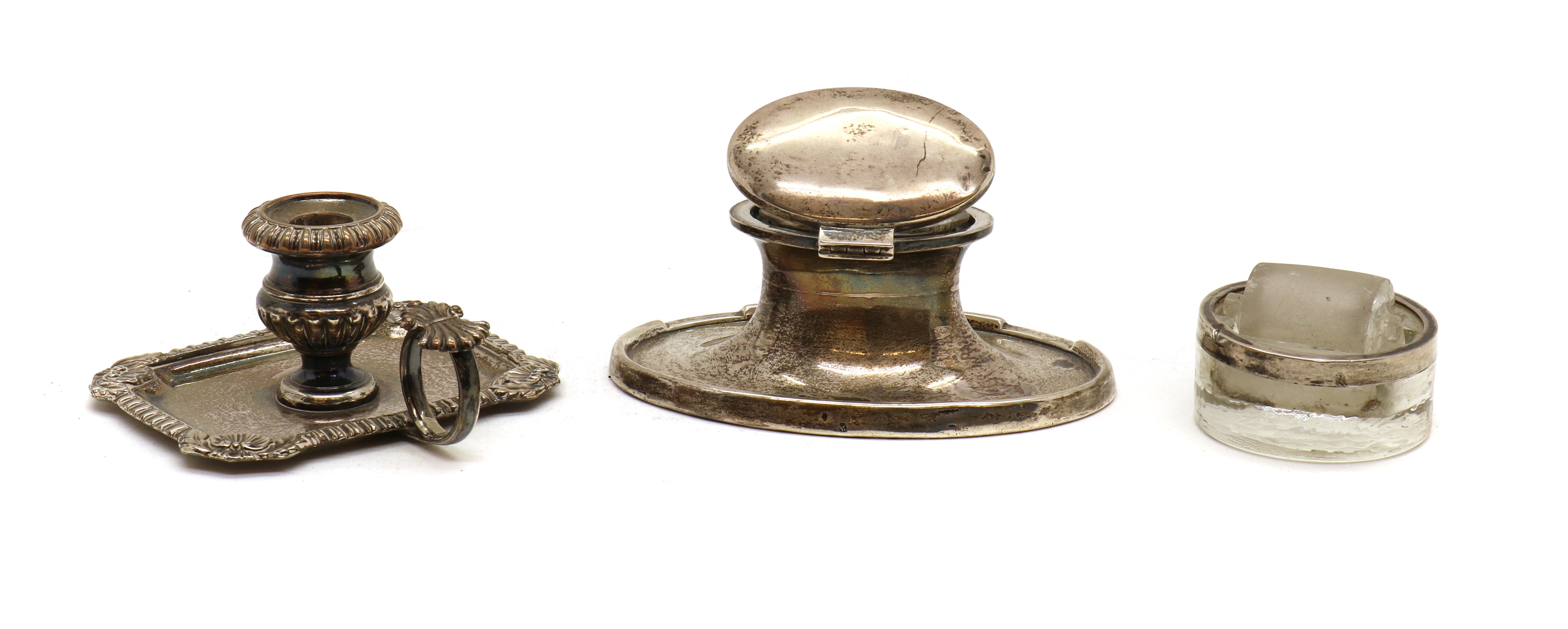 Lot 74 An oval silver capstan inkwell