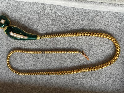 Lot 52 - A Victorian cased gold enamel and split pearl snake or serpent necklace