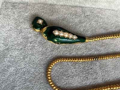 Lot 52 - A Victorian cased gold enamel and split pearl snake or serpent necklace