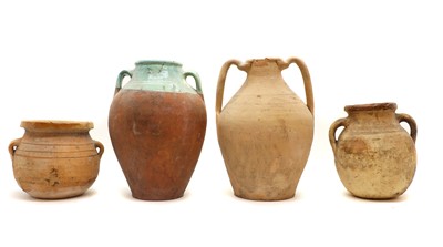Lot 148 - A collection of four earthenware vessels