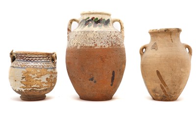 Lot 149 - A group of three earthenware jars