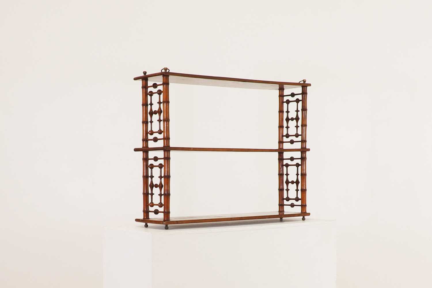 Lot 195 A set of walnut, faux bamboo, wall shelves,