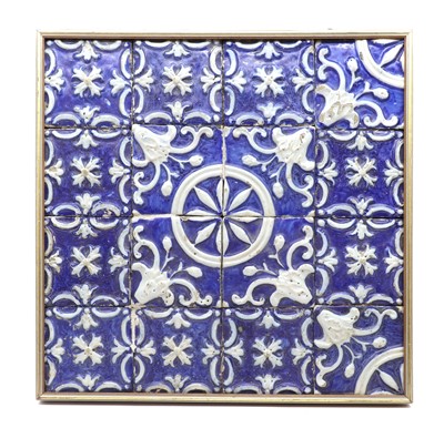 Lot 186 - A framed set of sixteen French maiolica tiles