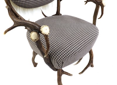 Lot 453 - A pair of antler chairs