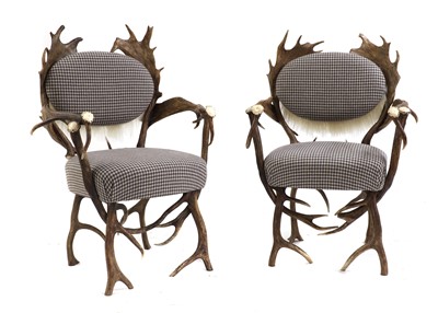 Lot 453 - A pair of antler chairs
