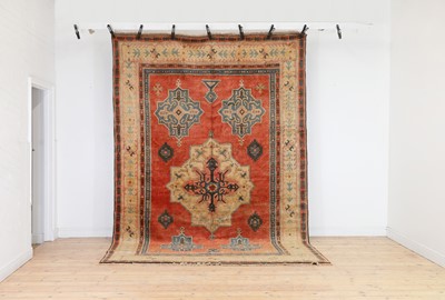 Lot 158 - A wool carpet of Persian Serapi design