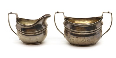 Lot 35 - A silver cream jug and twin-handled sugar bowl
